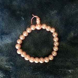 Pink pearl “Buddha” bracelet
